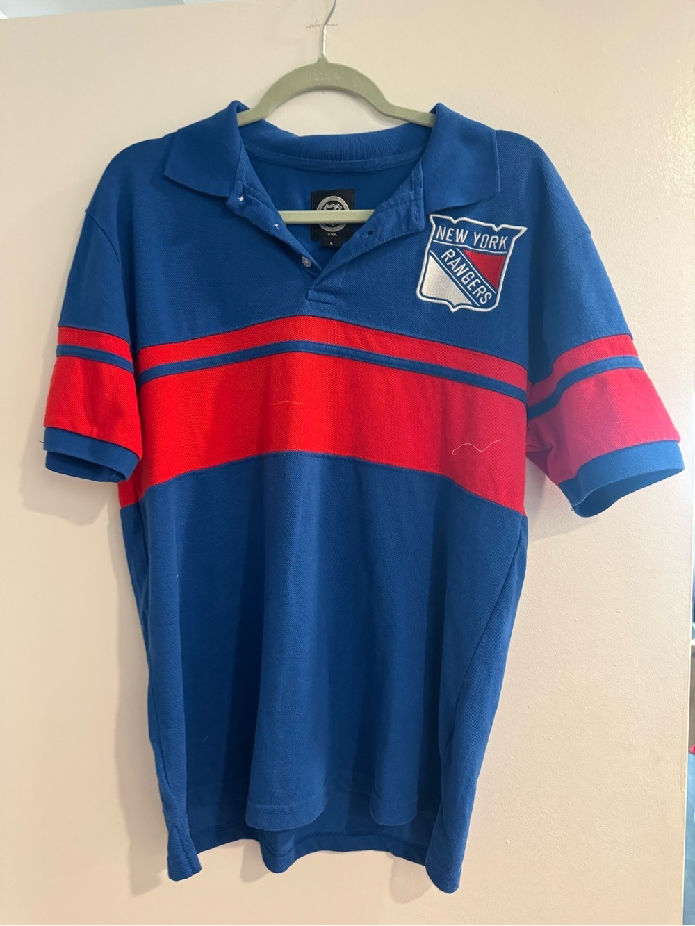 NHL Blue Polo Shirt with Black Shield Label